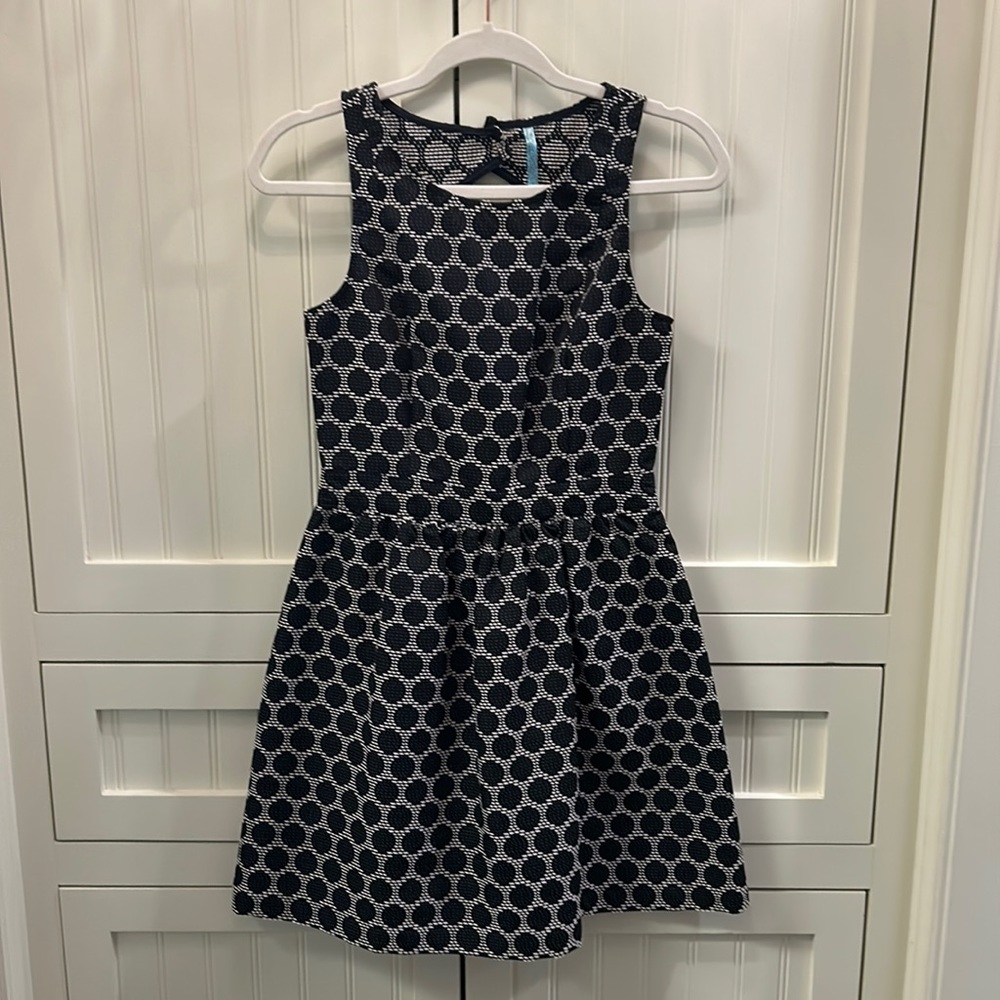 Navy polka dot mini dress with back cutout